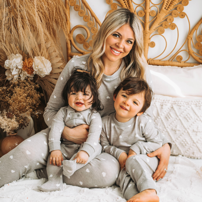 Black Sheep Fam mother, son and daughter wearing gray hearts