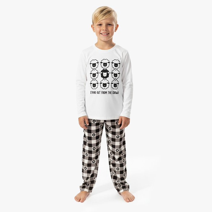 kid wearing white stand out shirt black sheep pant