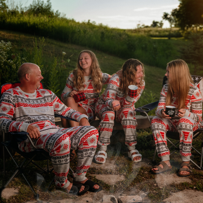 family wearing nordic fair isle camping