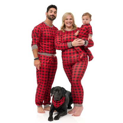 Family and dog all wearing red black buffalo 