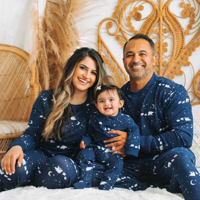 family wearing navy bear