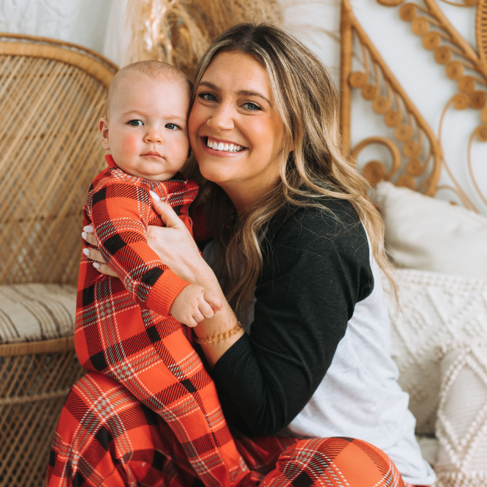 red plaid mom with raglan shirt and baby in onesie