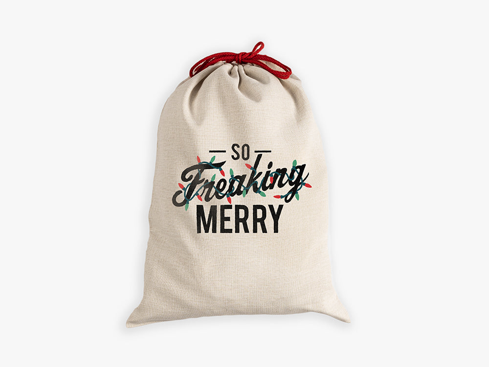Natural canvas santa sack with So Freaking Merry strung with multi colored lights and red drawcord