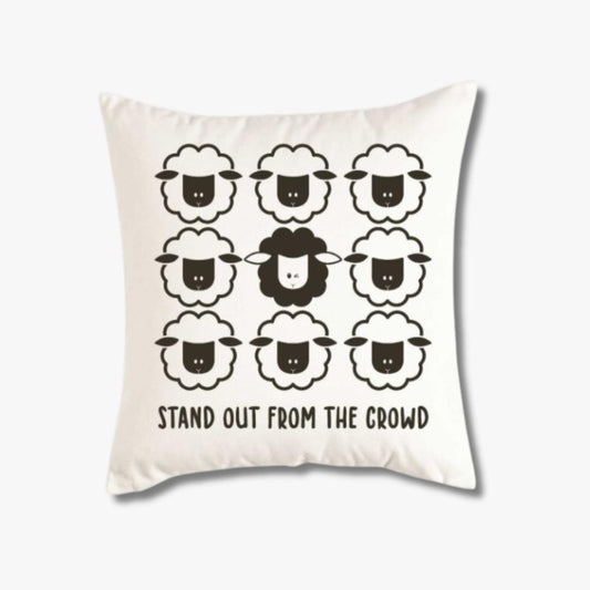 white pillow cover with stacked sheep saying stand out from the crowd