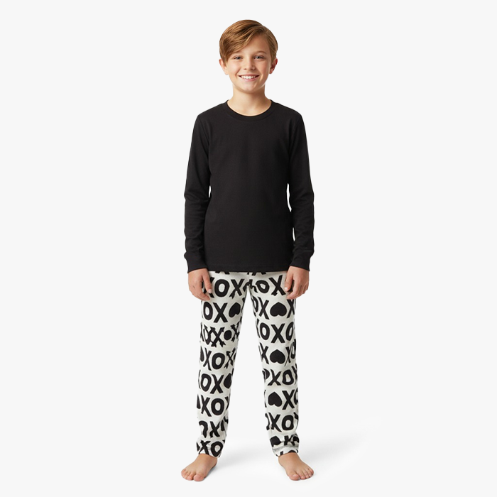 kid wearing black shirt white black xoxo pant